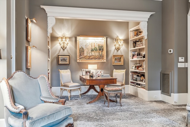 sitting room featuring carpet