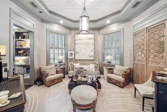 interior space featuring wood ceiling and a raised ceiling