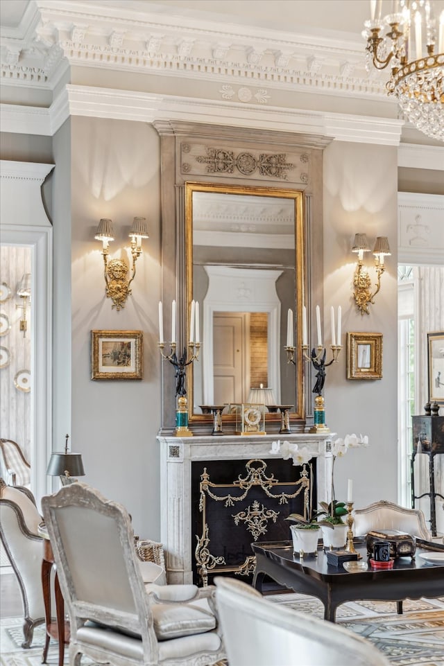 living room featuring ornamental molding and a notable chandelier