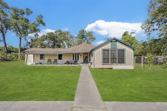 view of front of house featuring a front yard and a porch