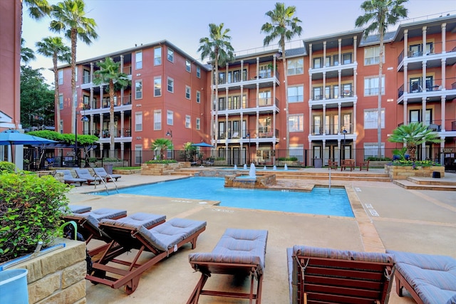 view of pool featuring a patio