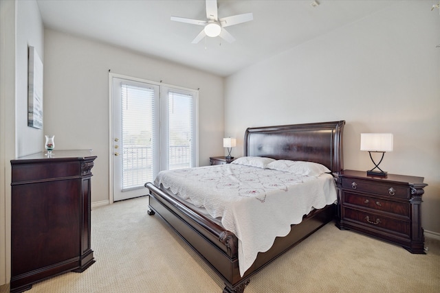 carpeted bedroom with access to outside and ceiling fan