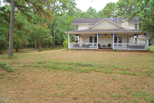 exterior space featuring a porch and a front yard