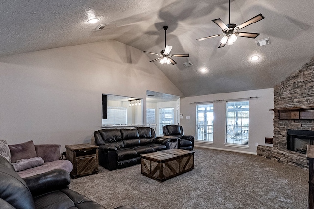 living room with a textured ceiling, carpet floors, a fireplace, high vaulted ceiling, and ceiling fan