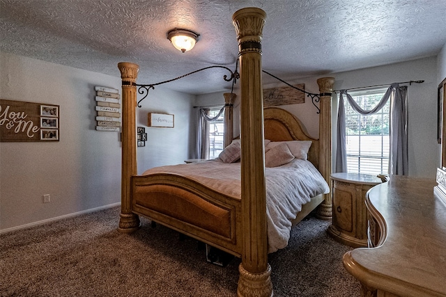 carpeted bedroom with a textured ceiling