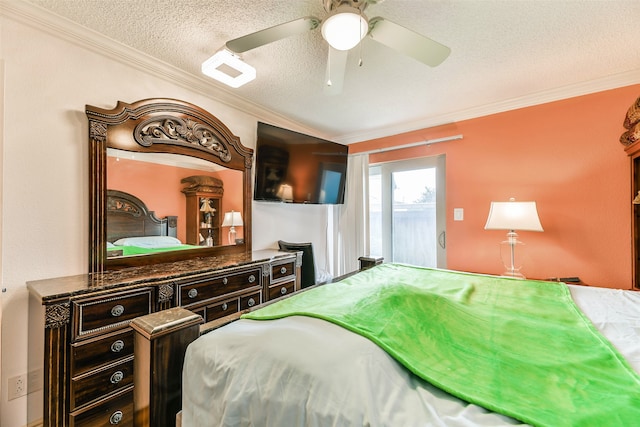 bedroom featuring a textured ceiling, ceiling fan, and ornamental molding