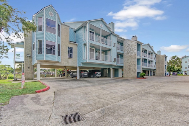 view of property with covered parking