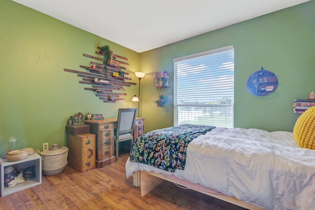 bedroom featuring wood-type flooring