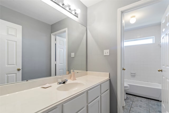 full bathroom featuring vanity, toilet, and bathing tub / shower combination