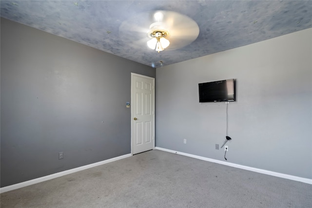 empty room featuring carpet flooring