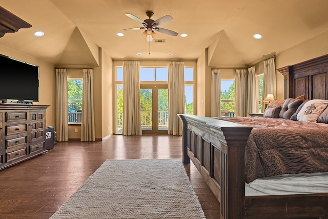 bedroom with multiple windows, access to outside, ceiling fan, and dark hardwood / wood-style floors