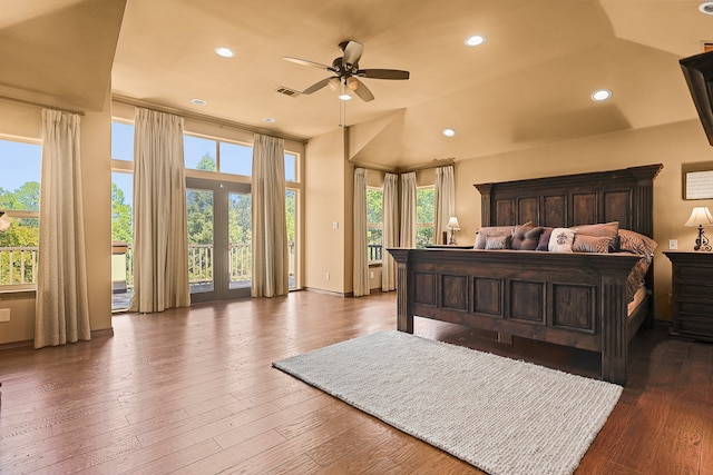 bedroom featuring dark wood-type flooring, ceiling fan, and access to exterior