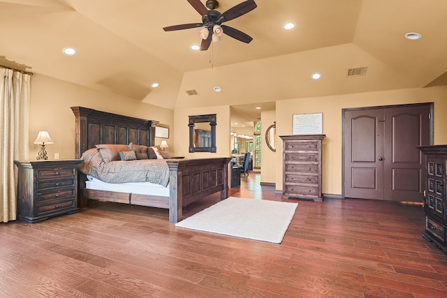 bedroom featuring vaulted ceiling, ceiling fan, and dark hardwood / wood-style floors