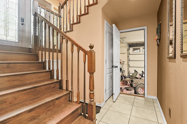 entrance foyer with light tile patterned floors