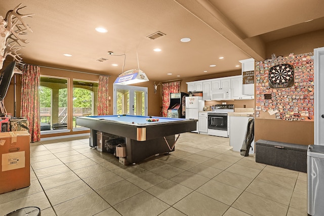 game room with billiards and light tile patterned floors