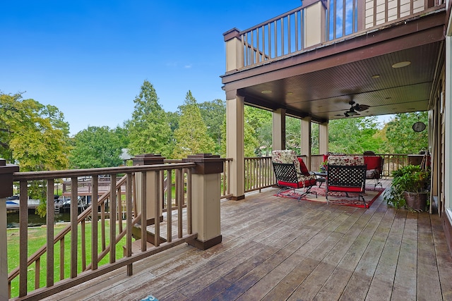 wooden deck with ceiling fan