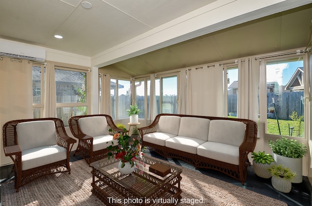 sunroom / solarium featuring a wall mounted air conditioner, a water view, and vaulted ceiling