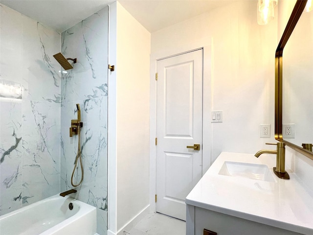 full bathroom with vanity, baseboards, and washtub / shower combination