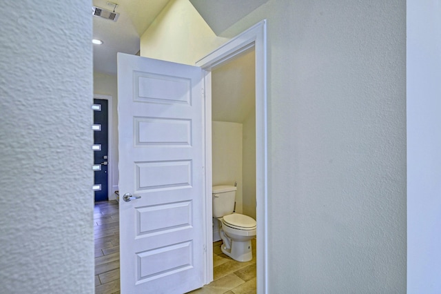 bathroom featuring toilet