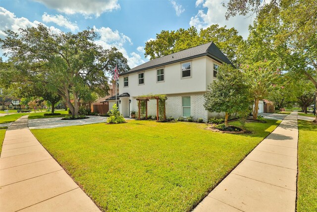 view of front of property with a front lawn