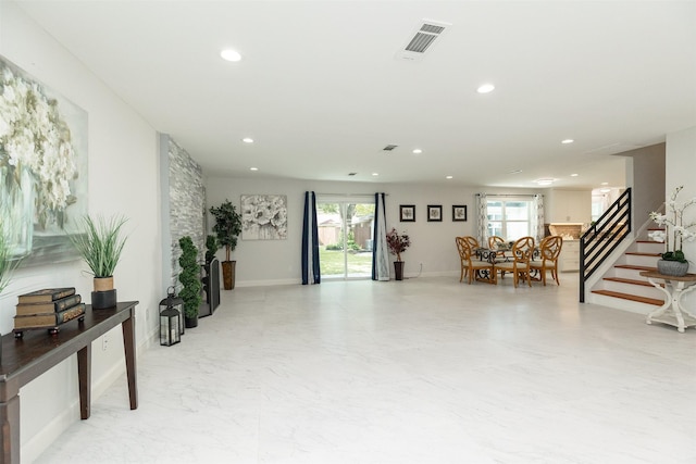 interior space featuring visible vents and stairway