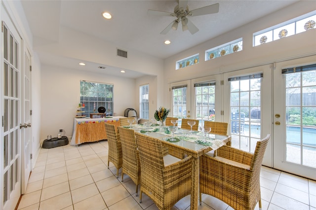 dining space with light tile patterned floors, ceiling fan, and french doors