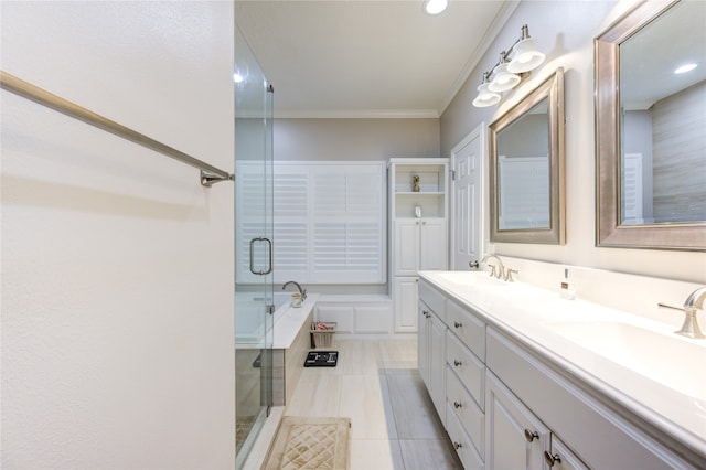 bathroom with ornamental molding, vanity, separate shower and tub, and tile patterned floors