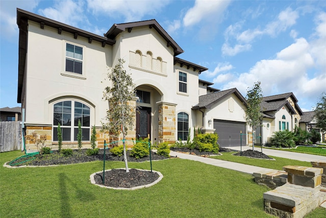 view of front of house with a front lawn and a garage