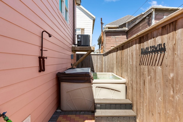 view of patio with central AC unit