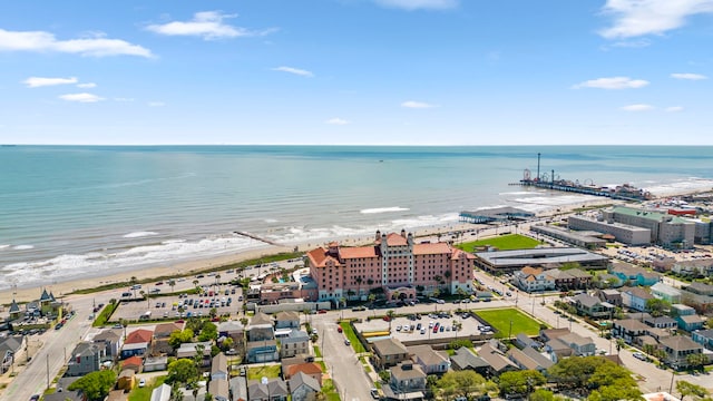 aerial view featuring a water view and a view of the beach