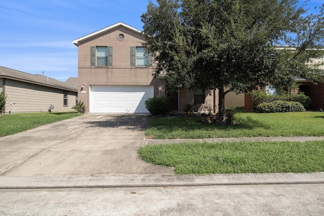 view of front of house with a garage and a front lawn