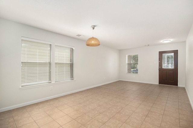 view of tiled spare room