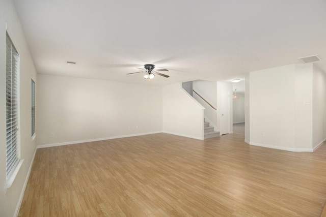 unfurnished living room with light hardwood / wood-style floors and ceiling fan