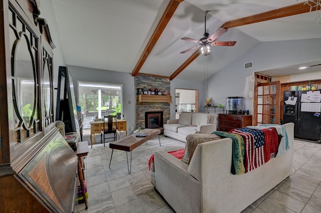 living room featuring beamed ceiling, a stone fireplace, high vaulted ceiling, ceiling fan, and light tile patterned flooring