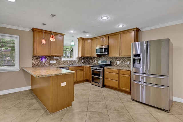 kitchen with hanging light fixtures, kitchen peninsula, a healthy amount of sunlight, and appliances with stainless steel finishes