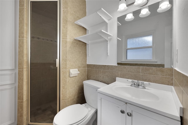 bathroom with an enclosed shower, toilet, tile walls, tasteful backsplash, and vanity