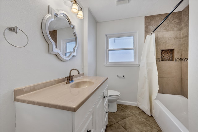 full bathroom with vanity, toilet, tile patterned floors, and shower / bath combo with shower curtain