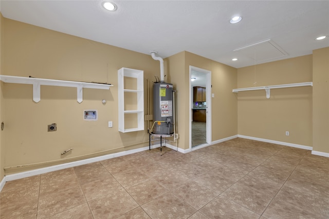 washroom with washer hookup, tile patterned floors, electric dryer hookup, and water heater