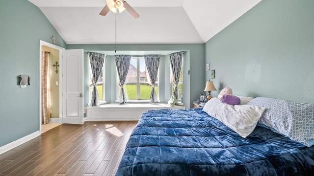 bedroom with lofted ceiling, ceiling fan, and hardwood / wood-style flooring