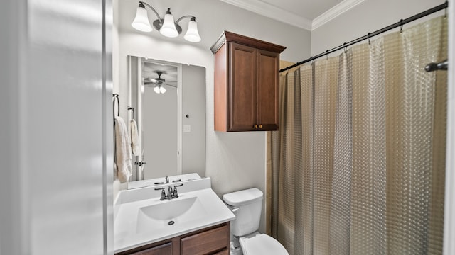 bathroom featuring walk in shower, toilet, vanity, ceiling fan, and ornamental molding