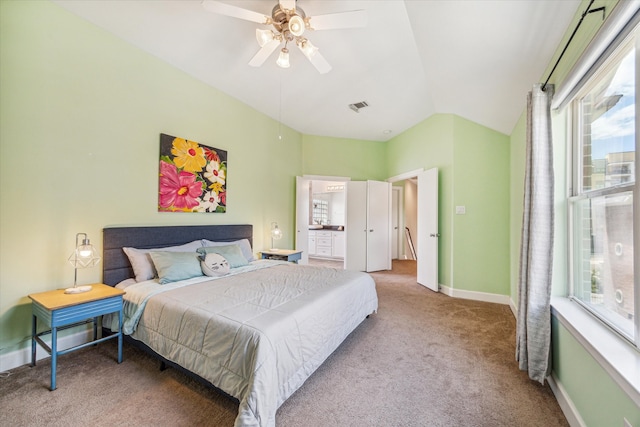 bedroom featuring vaulted ceiling, ceiling fan, and light colored carpet