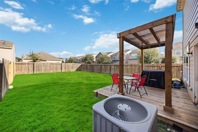 view of yard featuring central AC unit, a pergola, and a deck