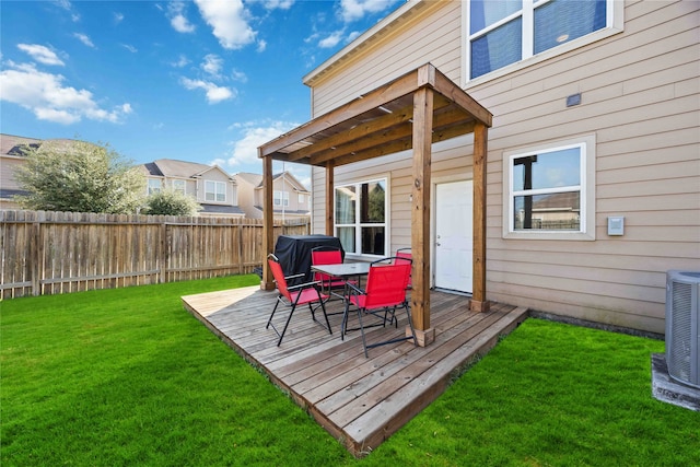 deck with a lawn, a grill, and central AC