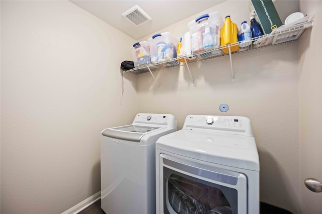 laundry room with washer and clothes dryer