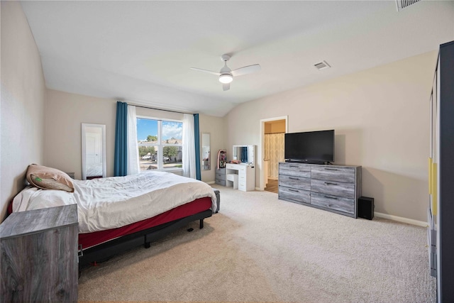 bedroom with ceiling fan, light carpet, and lofted ceiling