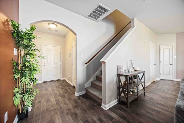 stairway featuring hardwood / wood-style flooring