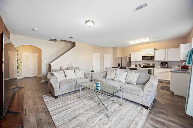 living room with wood-type flooring