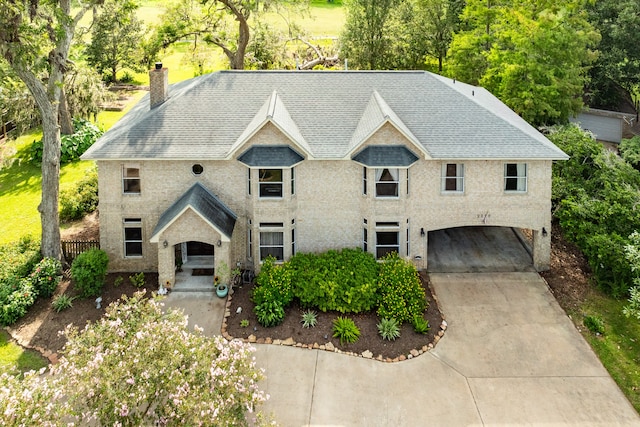 view of french country inspired facade