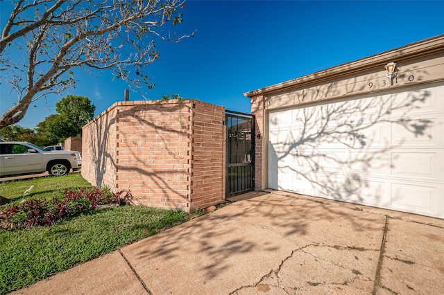 exterior space with a garage