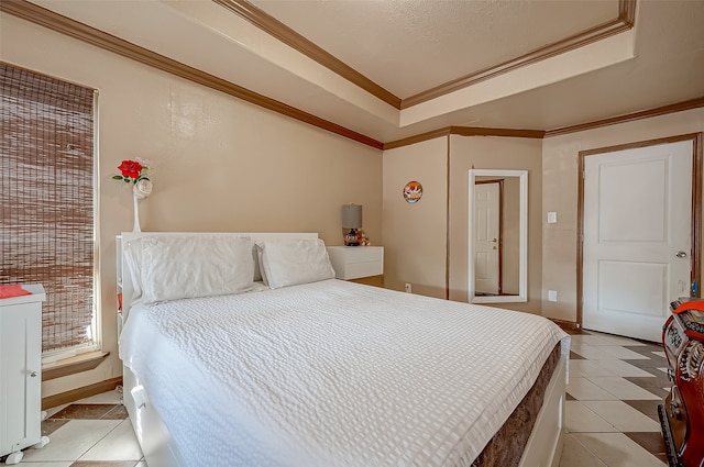 bedroom with light tile patterned floors and crown molding